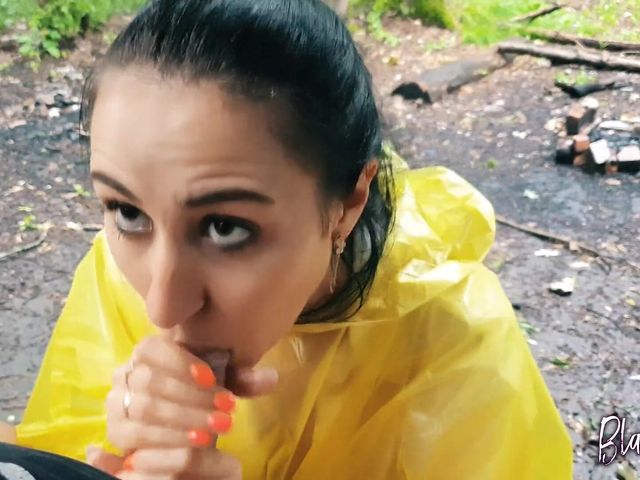 Brunette Girl in Yellow Raincoat Sucks Cock Outdoors (Sucker punch prod)